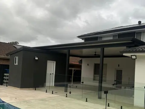 Pool and outdoor area of a renovated home in Chipping Norton, a St Anthony Building Group project