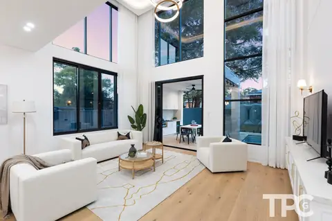 Double-height living room with tall windows – knockdown rebuild at 146 Wattle Road, Sutherland