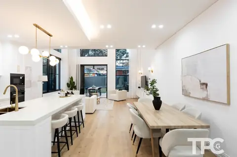 Open-plan kitchen, island bench and dining area – knockdown rebuild at 146 Wattle Road, Sutherland