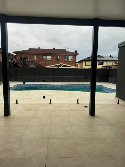 View from the covered outdoor area to the pool – renovation at 21 Aylesbury Crescent, Chipping Norton