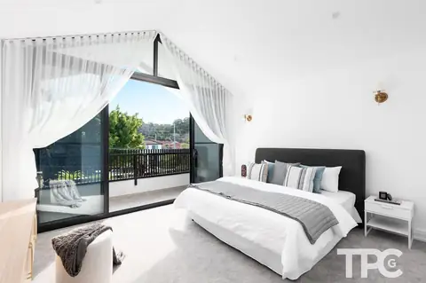 Bedroom with sliding doors to a balcony – knockdown rebuild at 146 Wattle Road, Sutherland