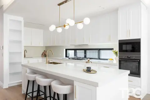 Kitchen with island bench, pendant lights and window splashback – knockdown rebuild at 146 Wattle Road, Sutherland