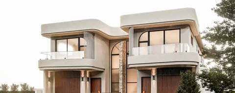 Architectural render: Street view of the two double-storey homes with curved rendered balconies, glass balustrades, a stone-clad feature column and timber garage doors – duplex in Sylvania